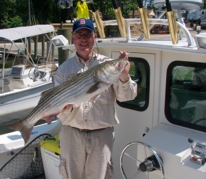 Jan Jamrog aboard his boat BAY VIEW with a 2014 rockfish.